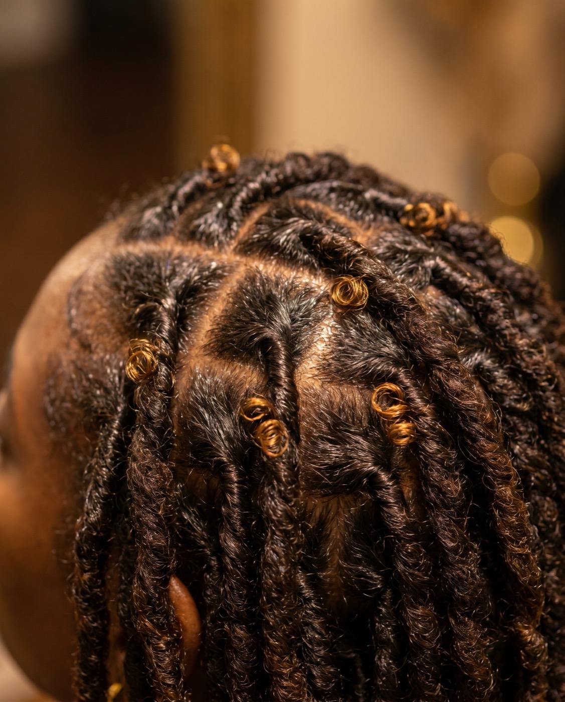 Freshly retwisted healthy locs, close detail